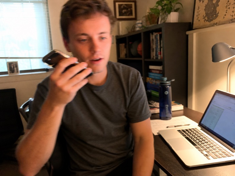 Person holding phone to ear checking if the sound sounds normal again
